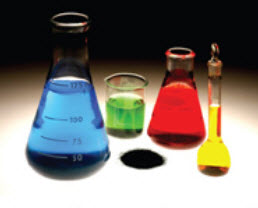 Picture of coloured liquids in scientific containers.